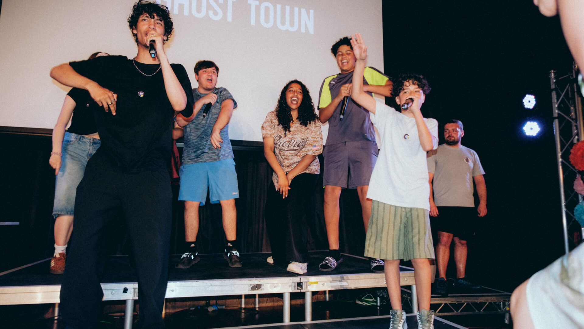 Group of people performing on stage