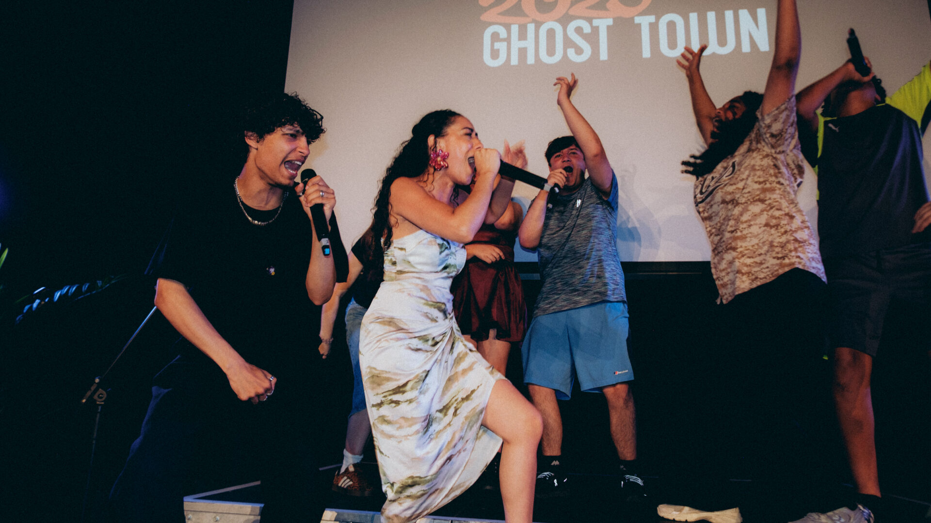 Group of people performing on stage