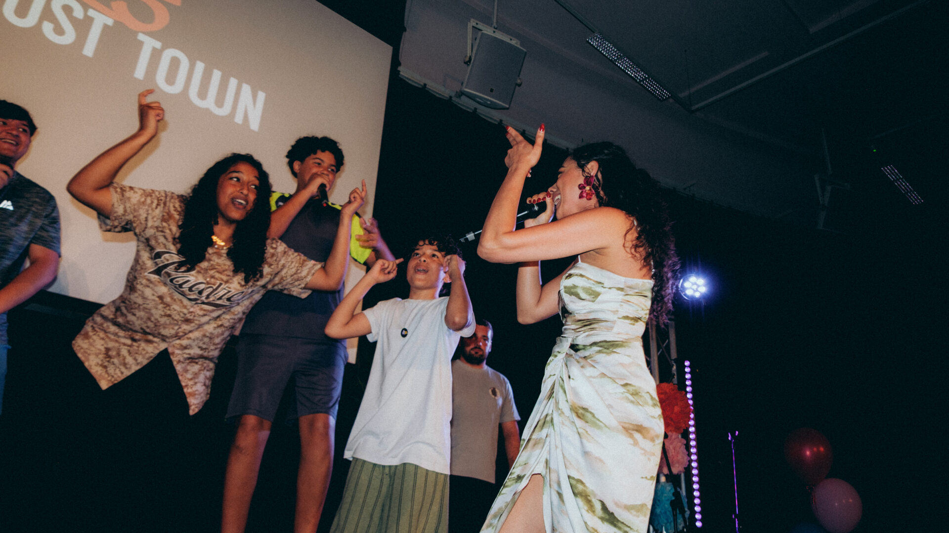 Group of people performing on stage